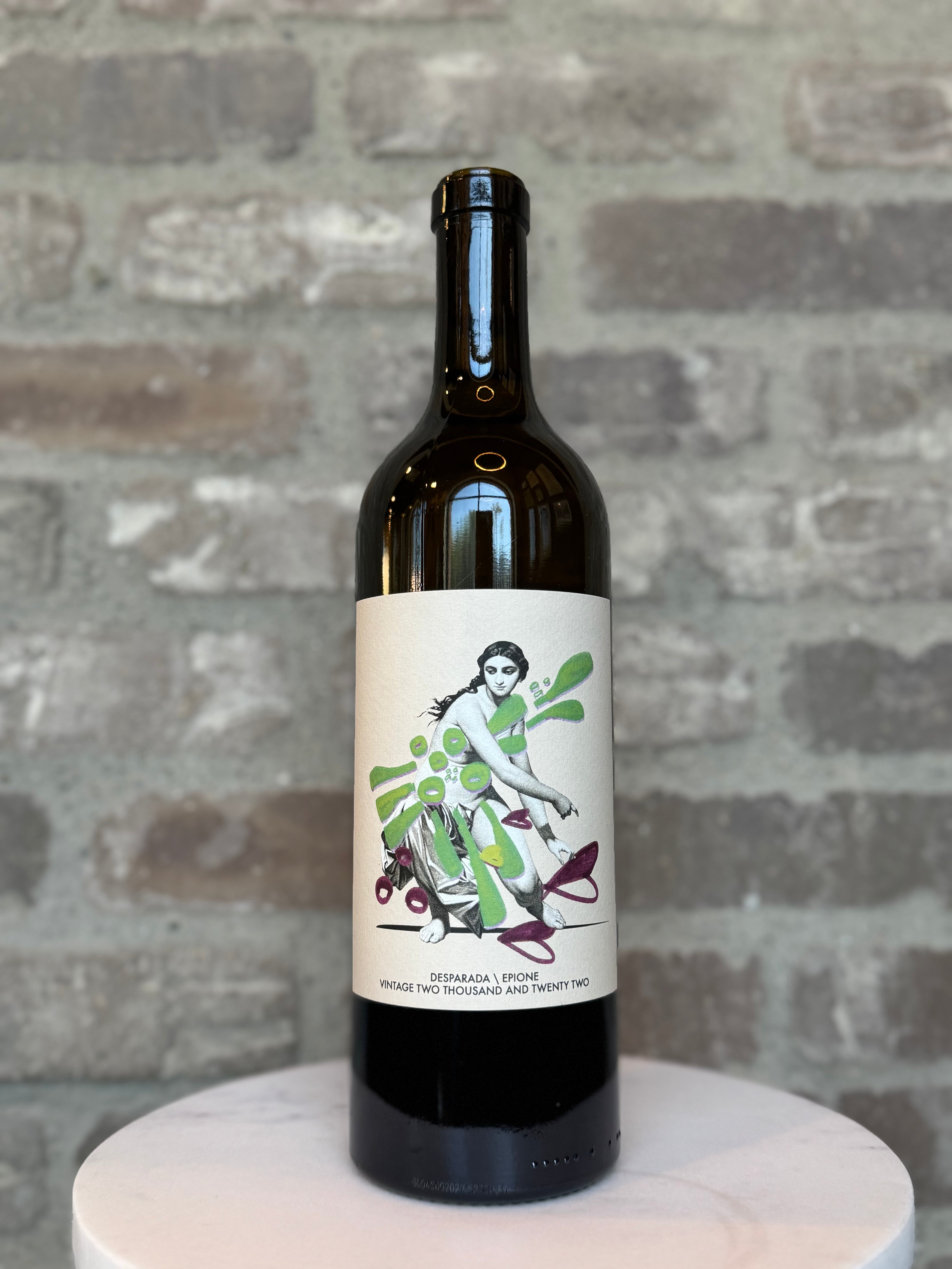 Wine bottle with a decorative label on a gray brick background