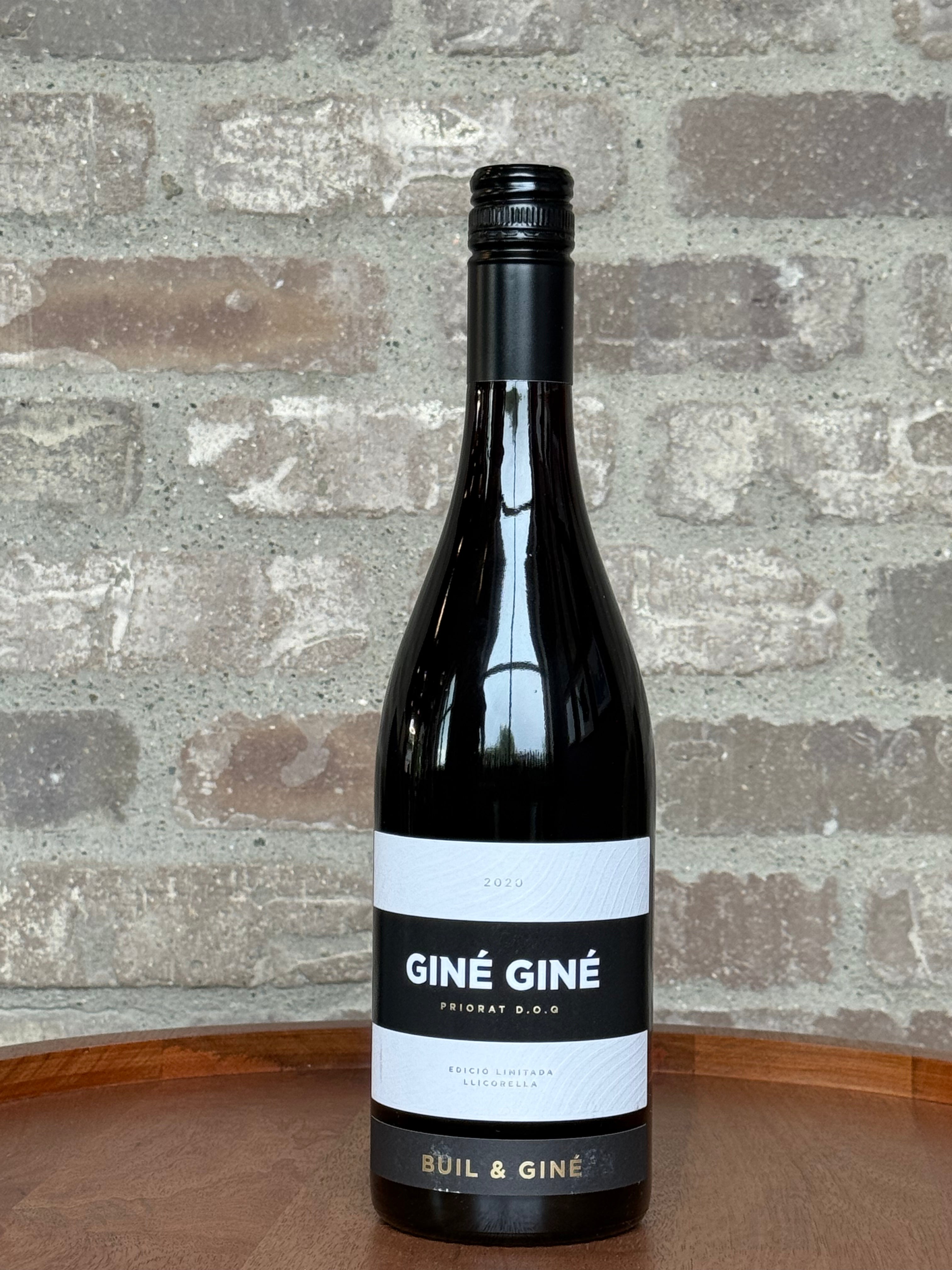 Bottle of Gine Gine wine against a brick wall background