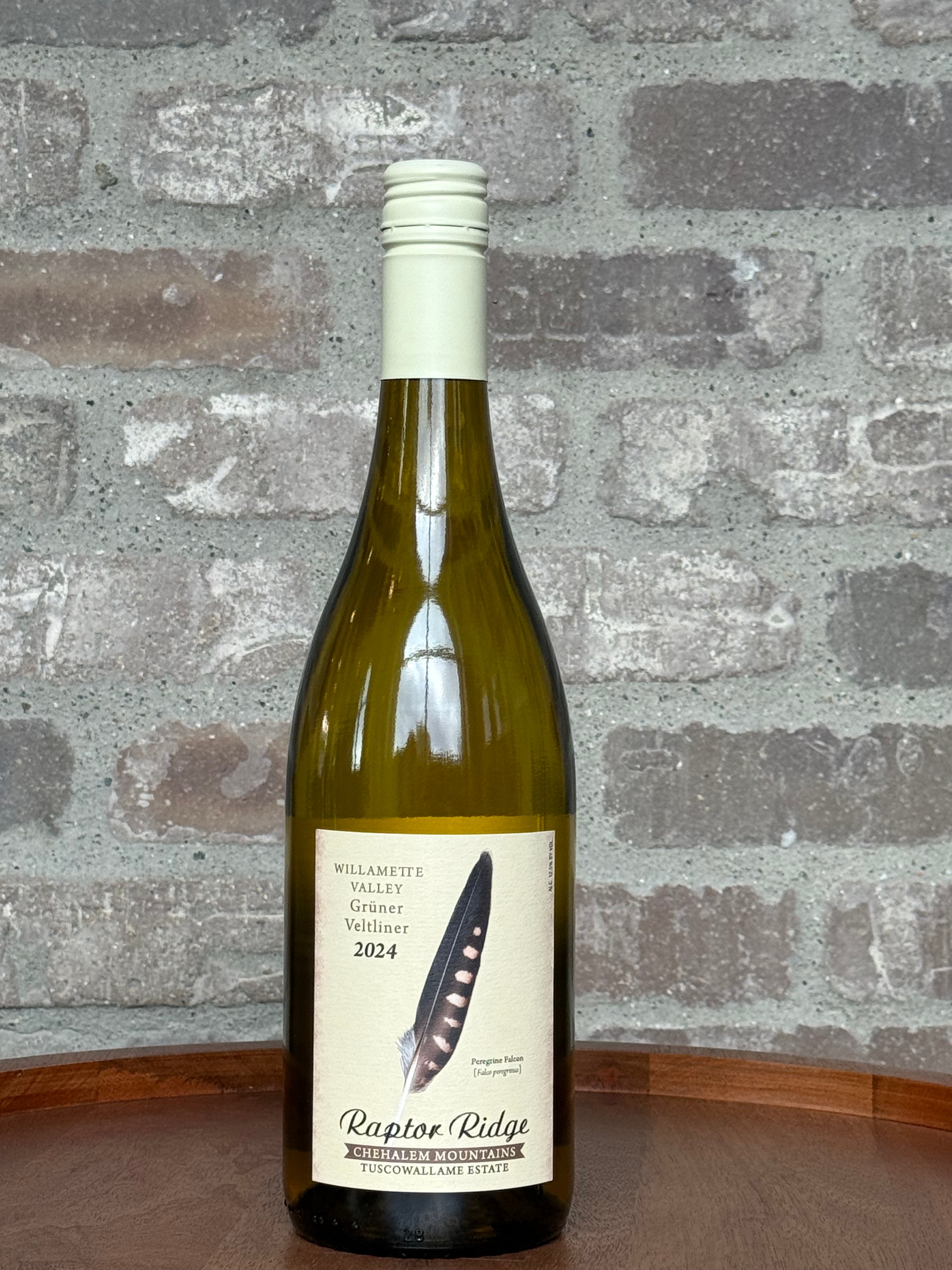 Wine bottle with label against a textured stone wall background